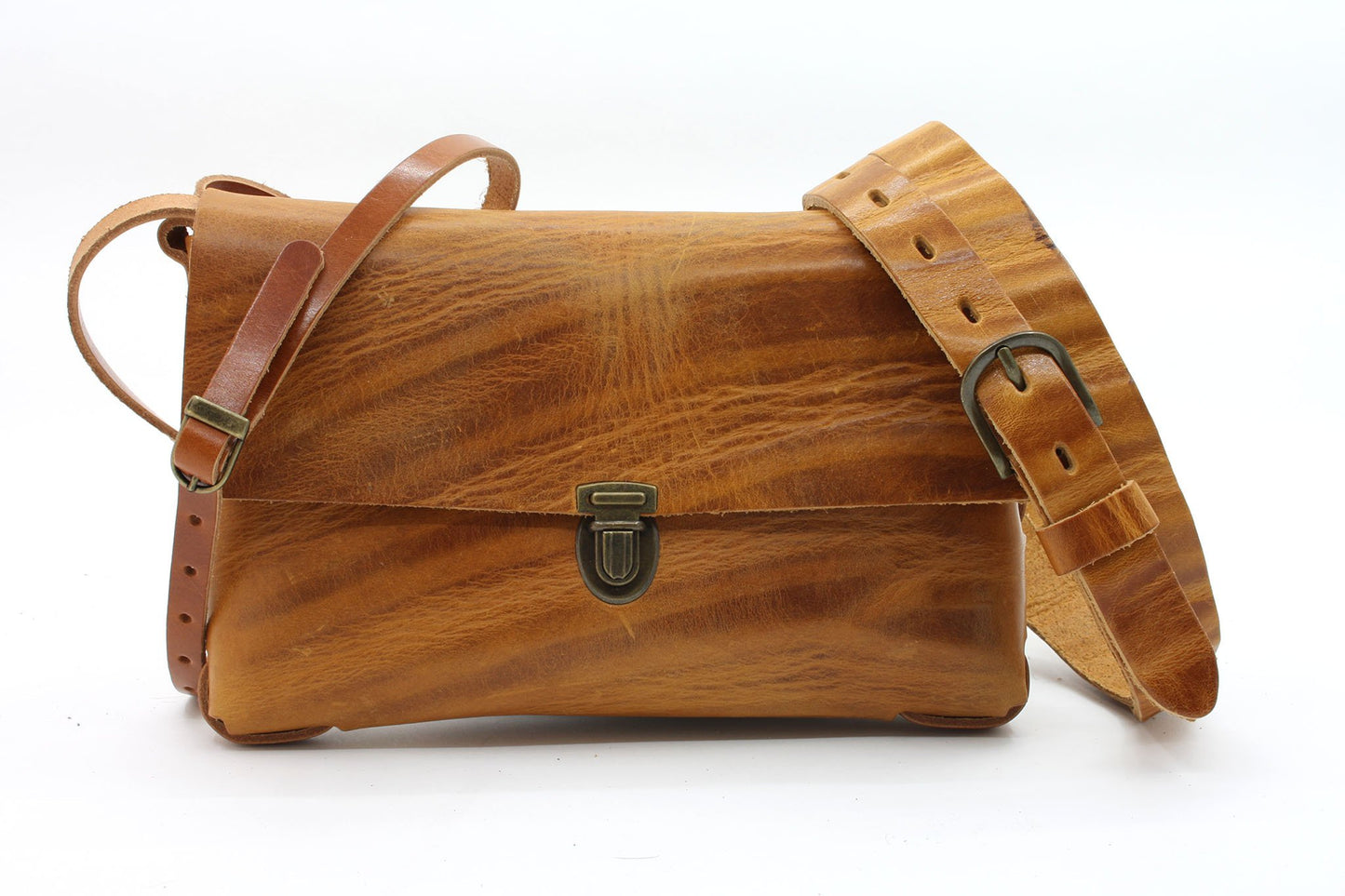 Dames riempje cognac wave (golvend) leer